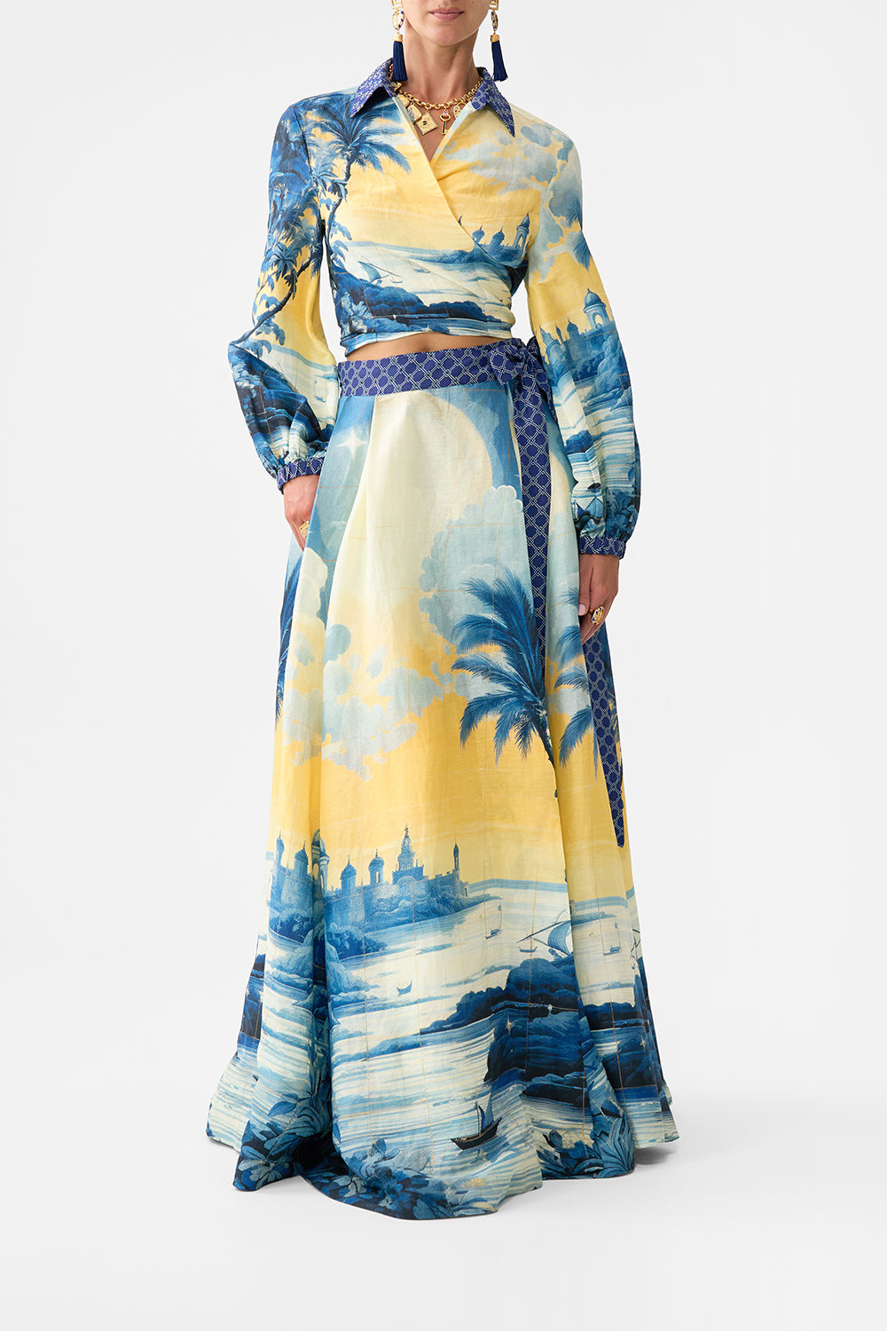 The CAMILLA KIDS DRAWSTRING MAXI DRESS W FRILL HEM 4-10 SPIRIT OF SANTA MARIA in our  print.