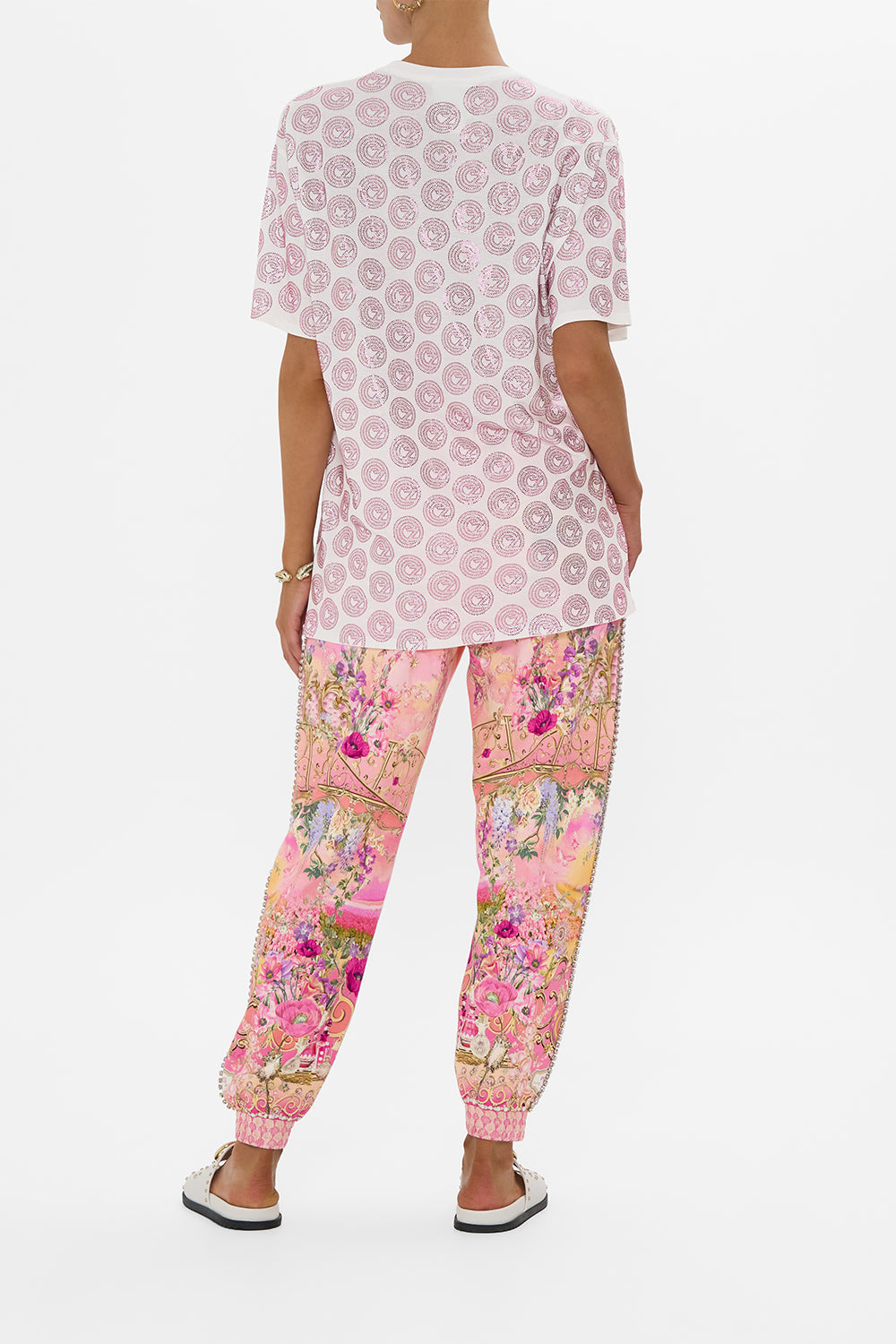 The CAMILLA SHORT SLEEVE CAMP COLLARED SHIRT CARMO AND CARMELITAS in our  print.