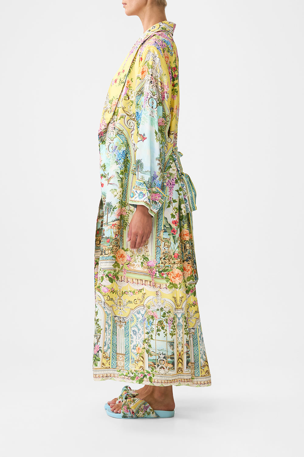 The CAMILLA OFF SHOULDER ELASTIC TOP FOOTSTEPS IN FOLKLORE in our  print.