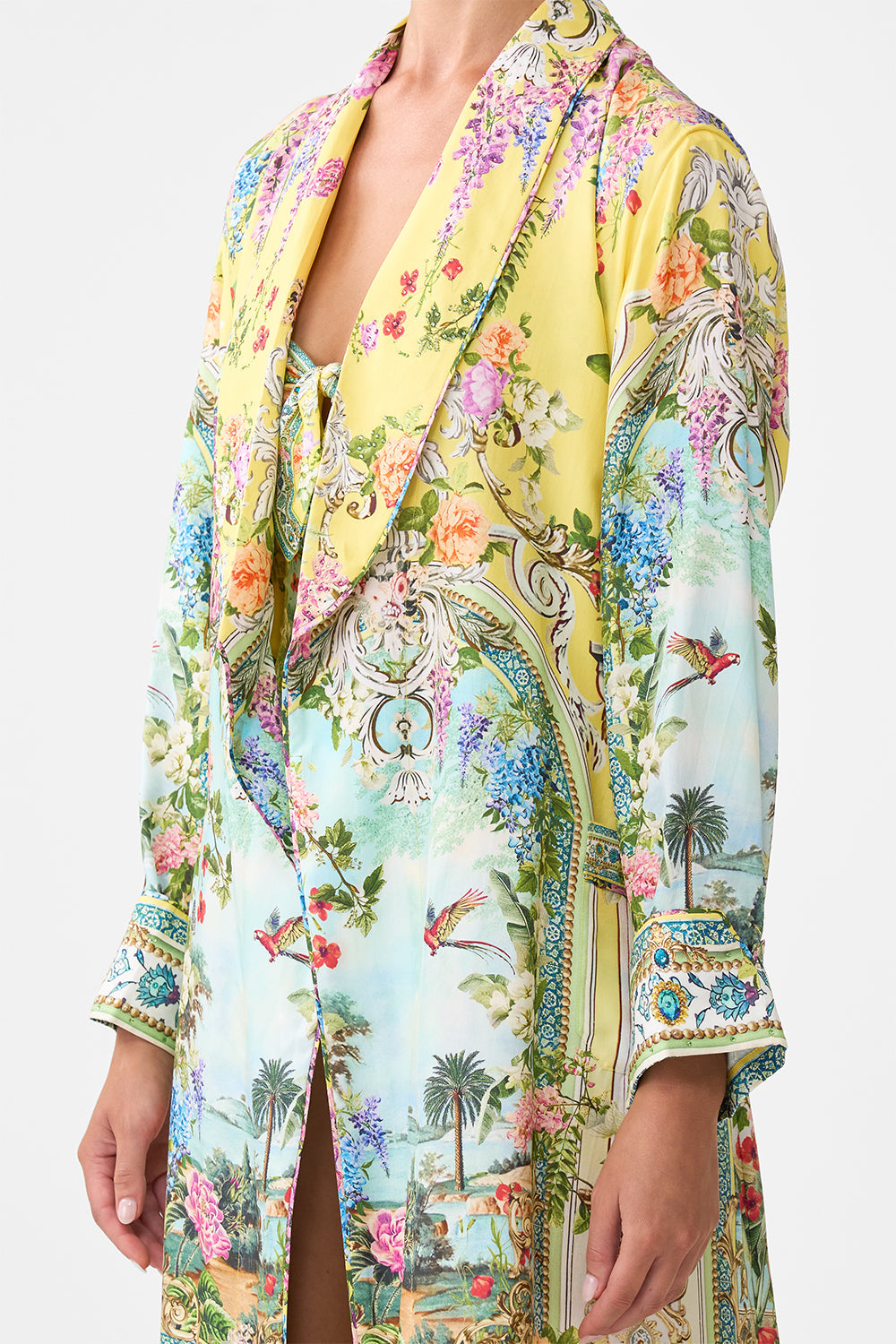 The CAMILLA OFF SHOULDER ELASTIC TOP FOOTSTEPS IN FOLKLORE in our  print.