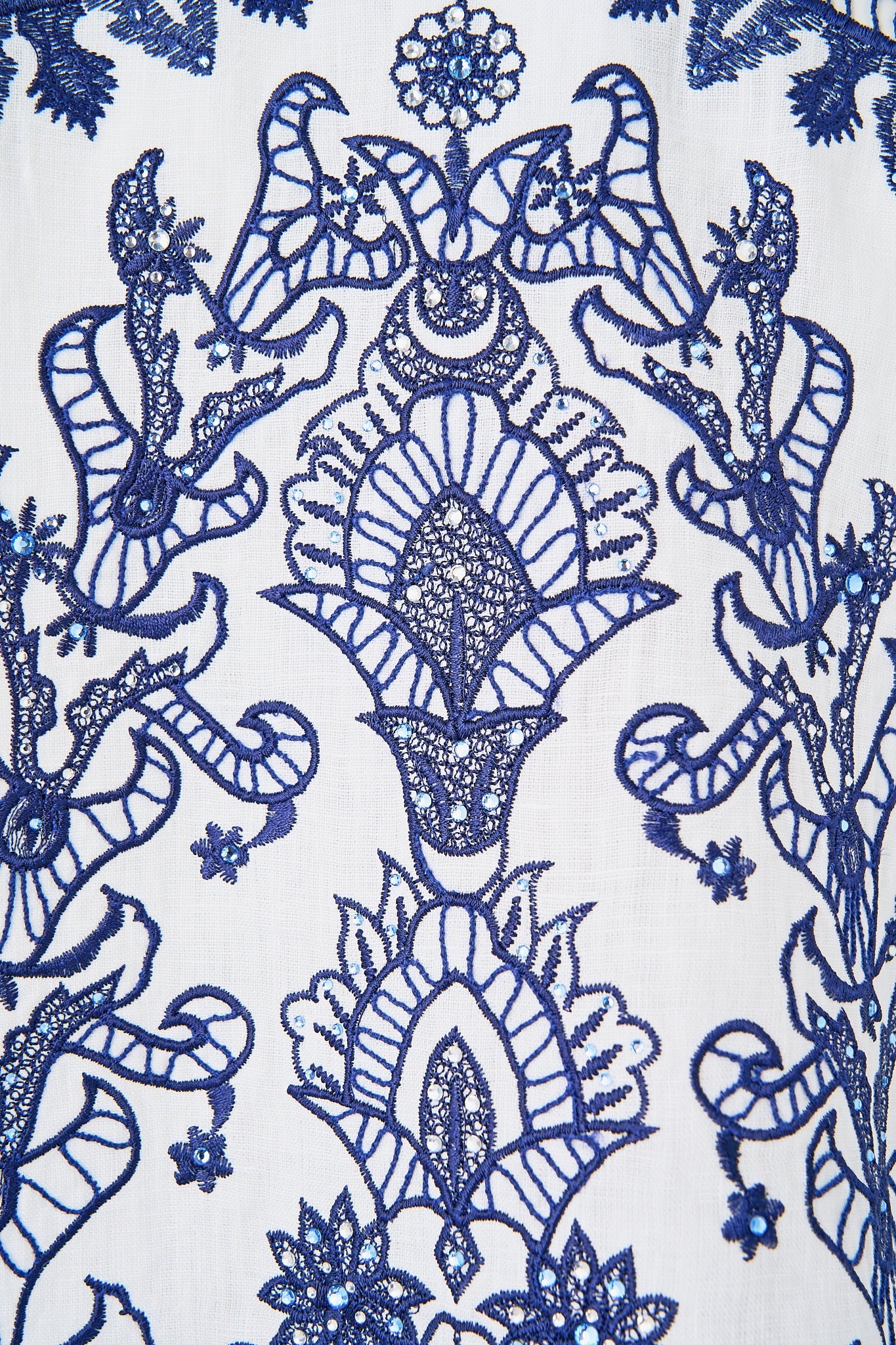 The CAMILLA HARDCASE CLUTCH WITH RAFFIA DETAIL NOTES FROM THE ROAD in our  print.