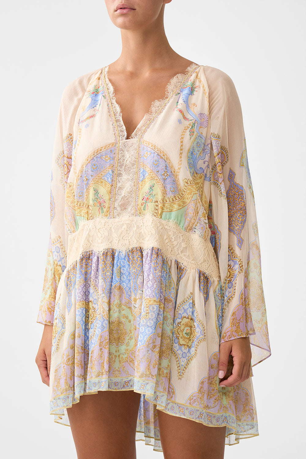 The CAMILLA WAISTED DRESS WITH HEM RUFFLE COSMIC ZOOLOGY in our  print.