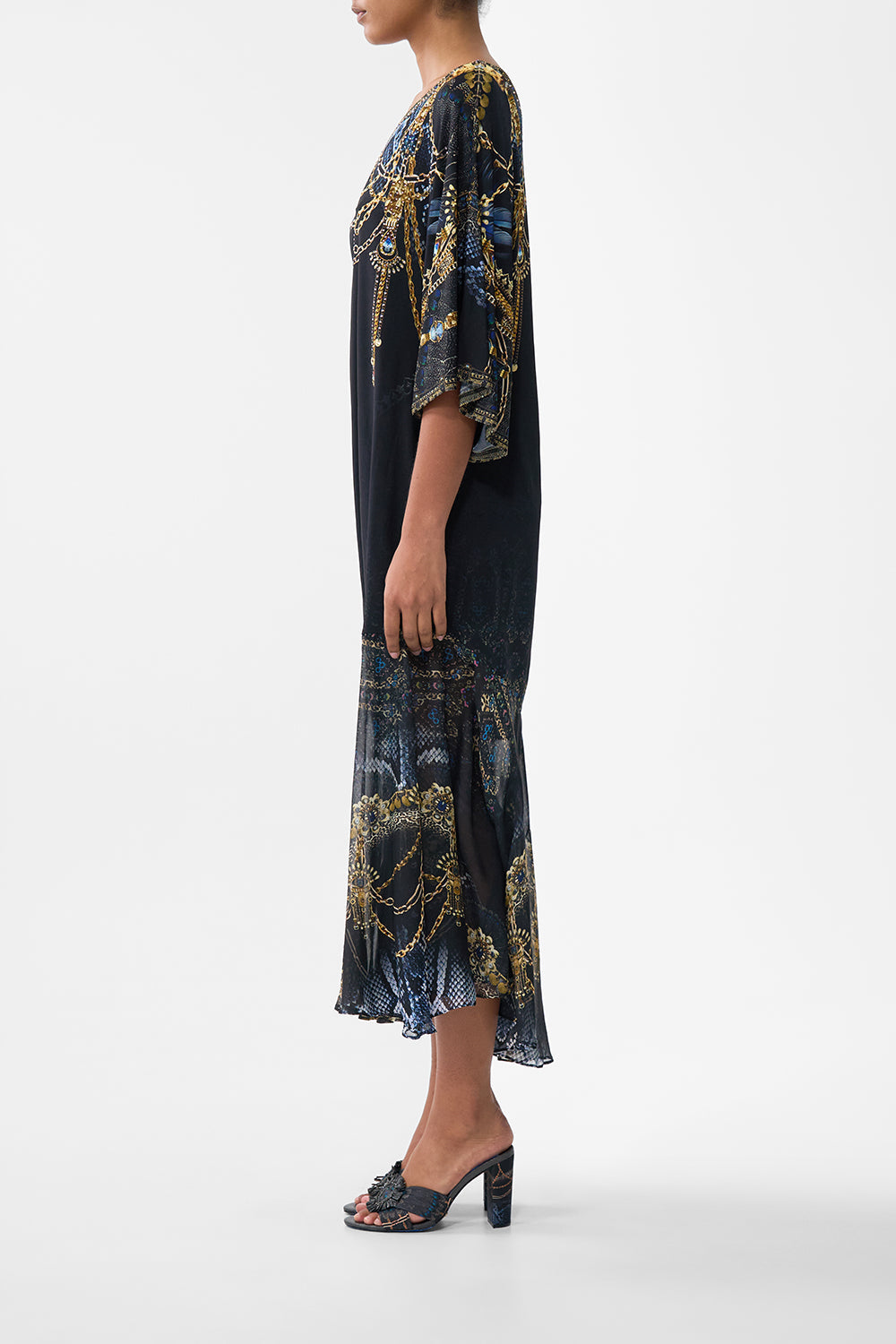 The CAMILLA PIERCED V NECK KAFTAN COSMIC ZOOLOGY in our  print.