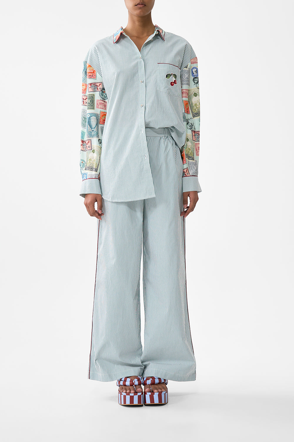 The CAMILLA TIERED SHORT DRESS WITH NECK FRILL A CERAMIC GARDEN in our  print.