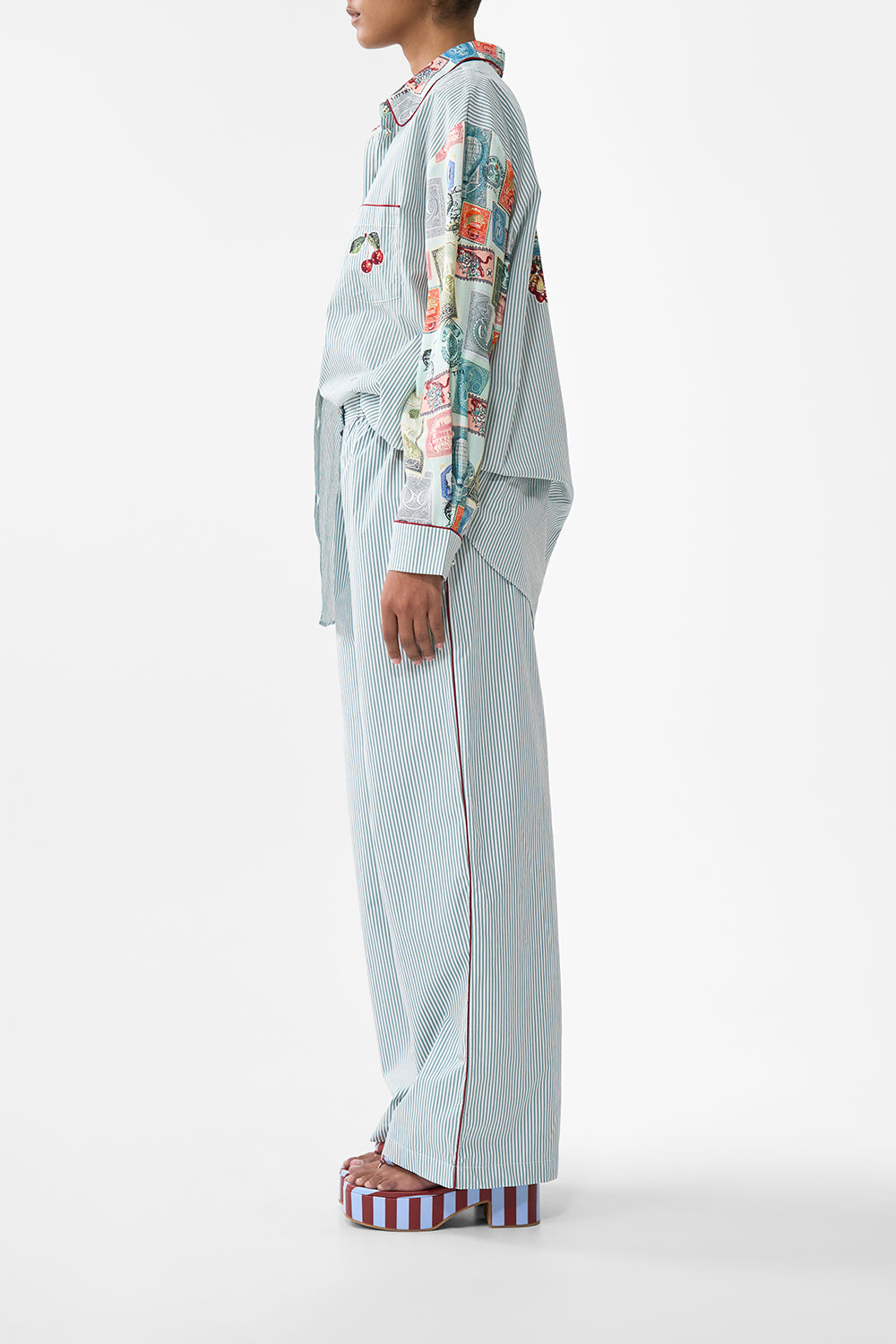 The CAMILLA TIERED SHORT DRESS WITH NECK FRILL A CERAMIC GARDEN in our  print.