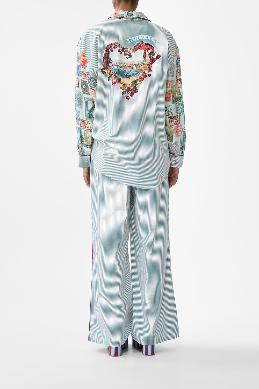 The CAMILLA TIERED SHORT DRESS WITH NECK FRILL A CERAMIC GARDEN in our  print.