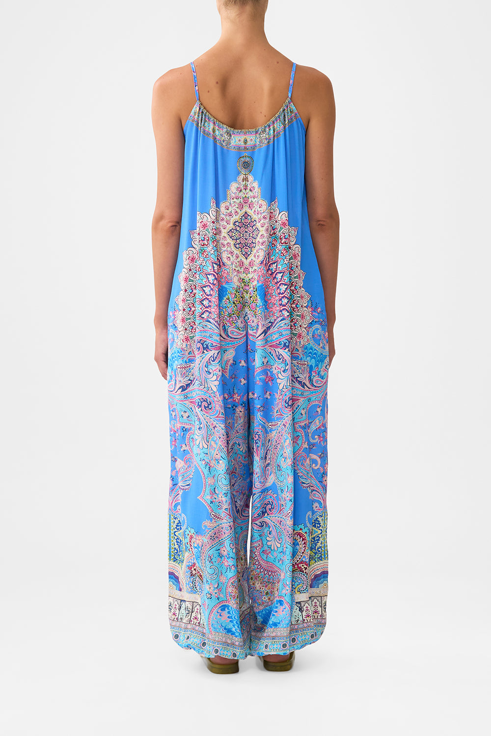 The CAMILLA FRONT PLEAT STRAPLESS JUMPSUIT NOTES FROM THE ROAD in our  print.