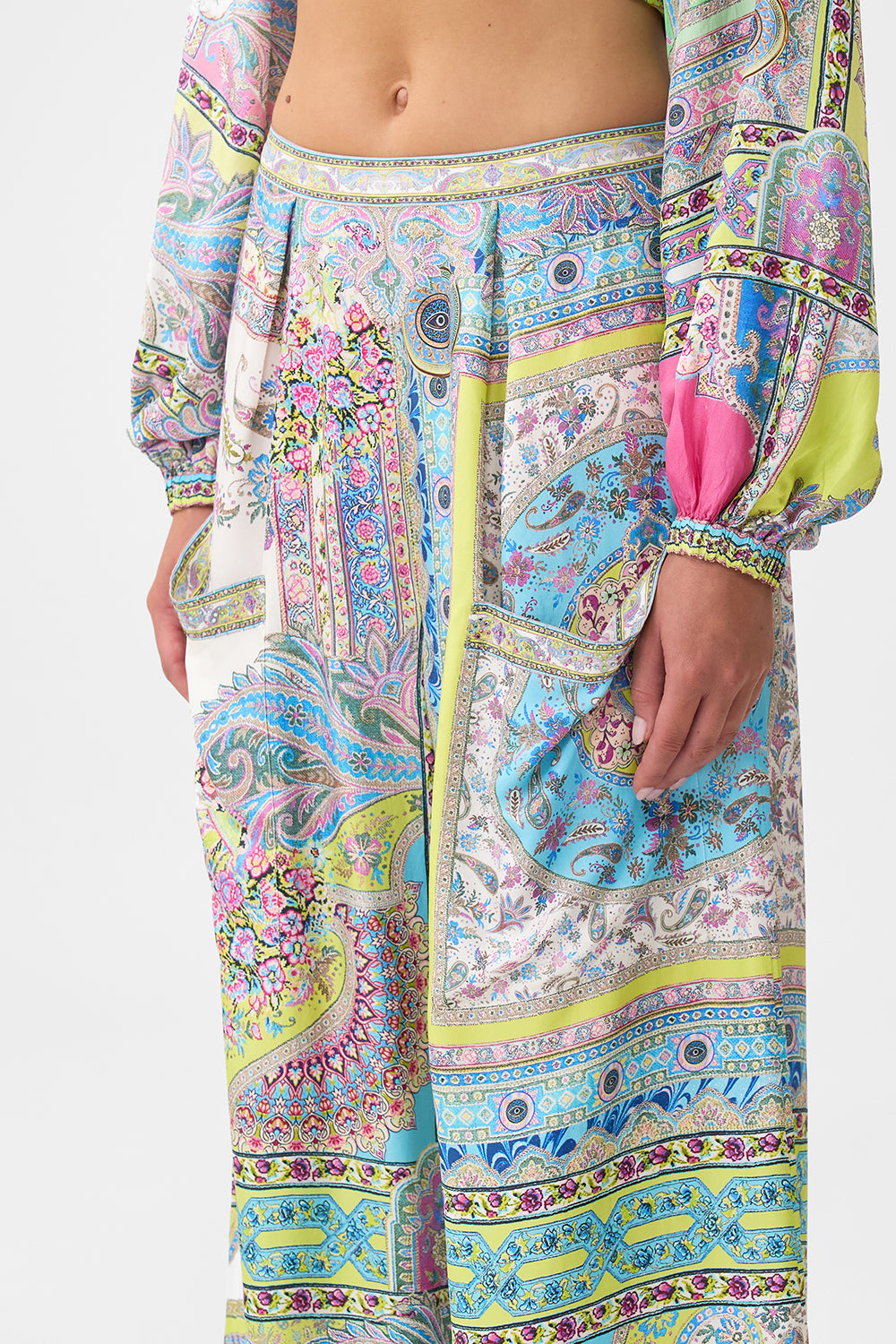 The CAMILLA LACE DEEP V NECK HARDWARE SHORT DRESS SONG OF THE SOLSTICE in our  print.