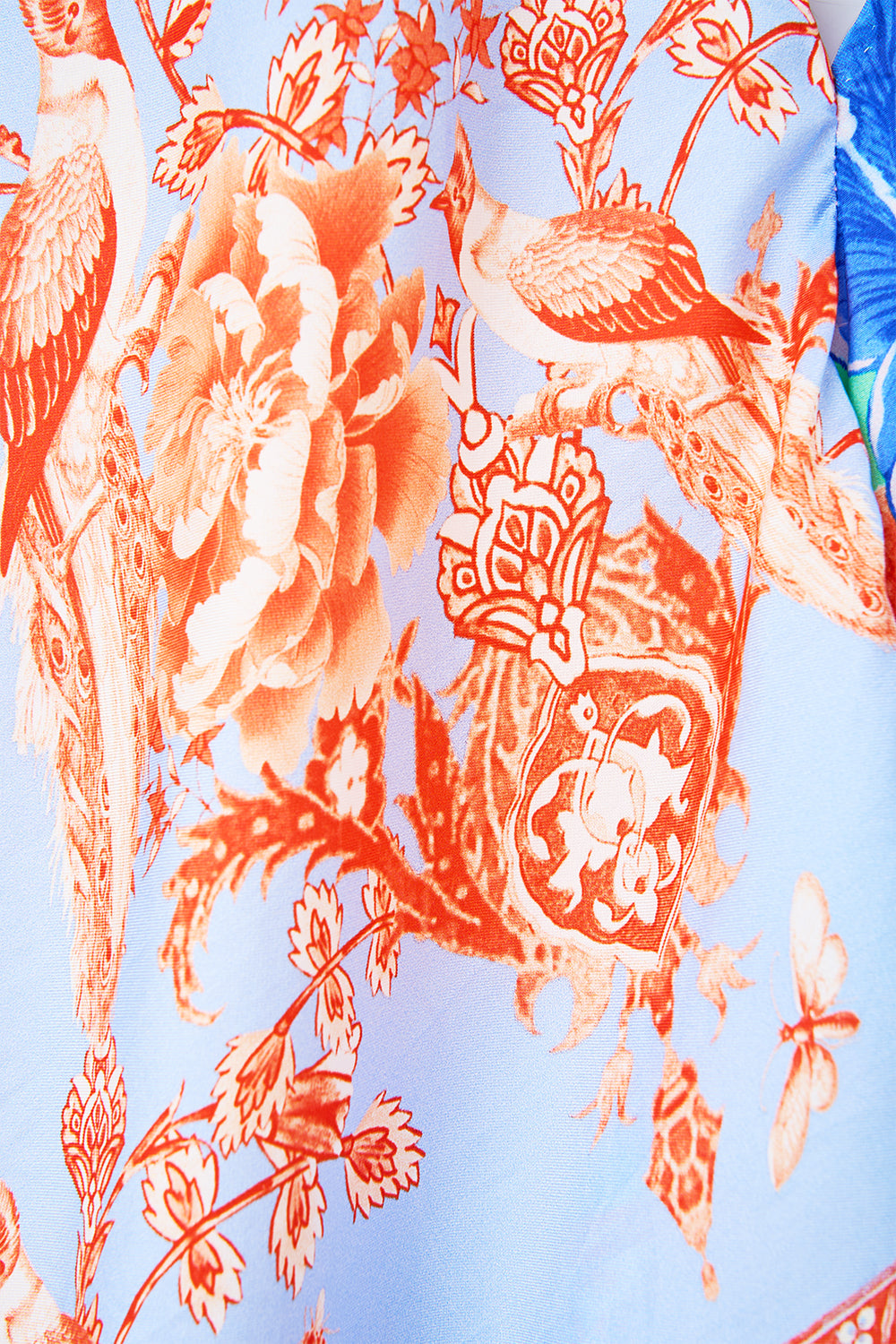 The CAMILLA DEEP V NECK HARDWARE SHORT KAFTAN COSMIC ZOOLOGY in our  print.