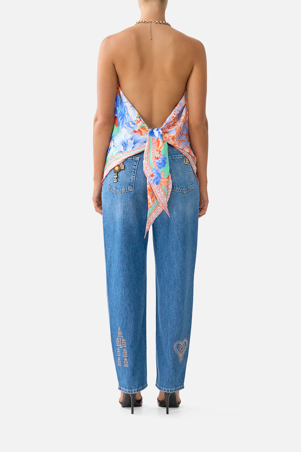 The CAMILLA DEEP V NECK HARDWARE SHORT KAFTAN COSMIC ZOOLOGY in our  print.