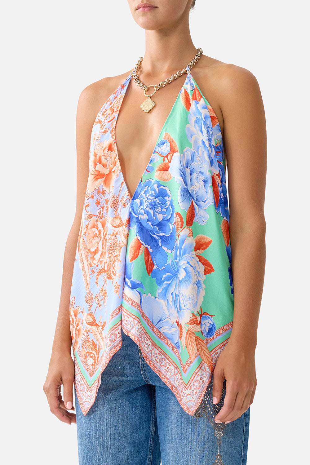 The CAMILLA DEEP V NECK HARDWARE SHORT KAFTAN COSMIC ZOOLOGY in our  print.
