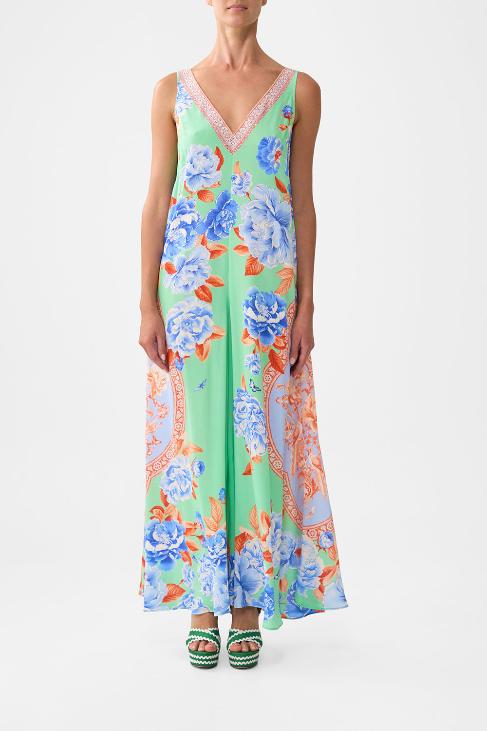 The CAMILLA SHAPED WAISTBAND DRESS WITH RUFFLE SLEEVE ANIMAL ALCHEMY in our  print.