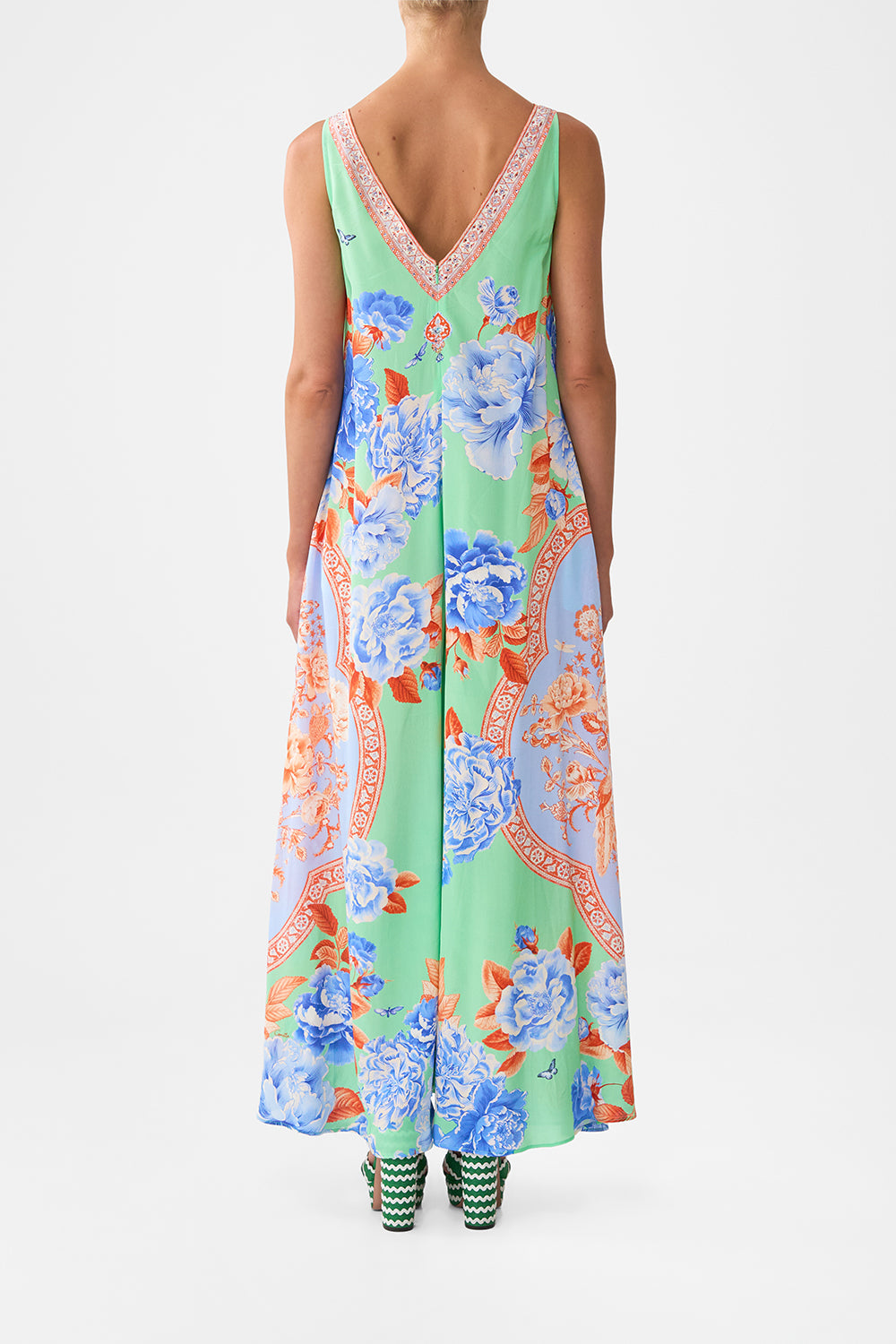 The CAMILLA SHAPED WAISTBAND DRESS WITH RUFFLE SLEEVE ANIMAL ALCHEMY in our  print.