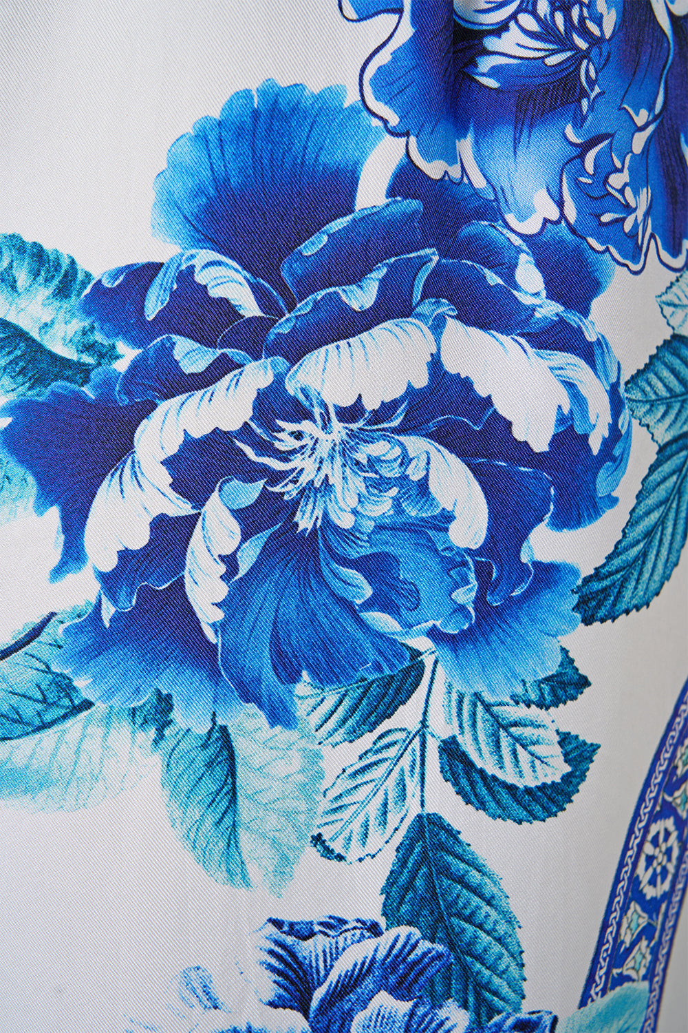 The CAMILLA LACE UP FRONT BLOUSON SLEEVE BLOUSE FABRIC OF TIME in our FABRIC OF TIME print.