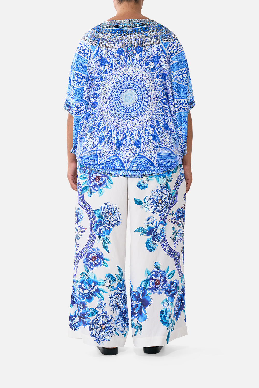 The CAMILLA LACE UP FRONT BLOUSON SLEEVE BLOUSE FABRIC OF TIME in our  print.
