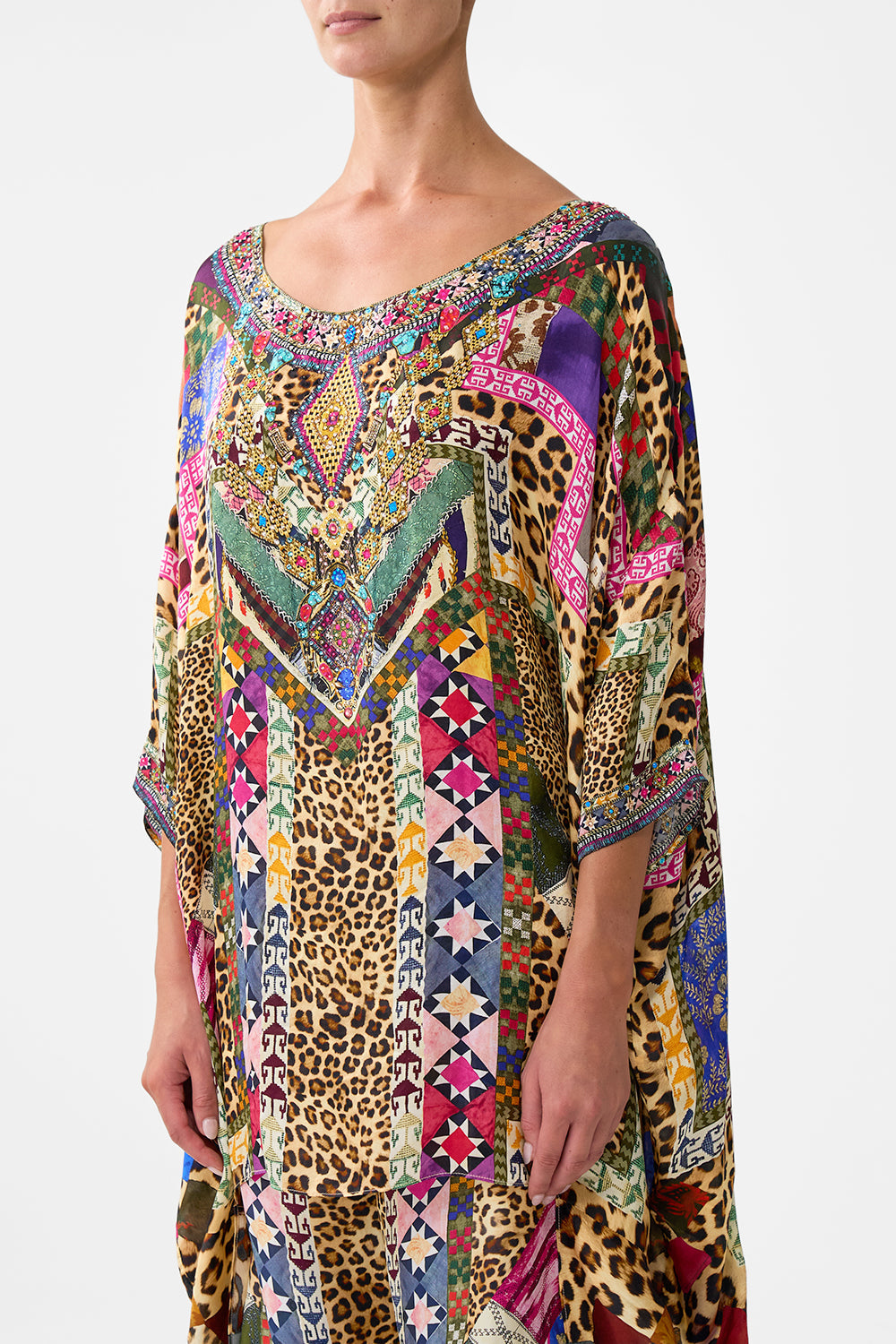 The CAMILLA CROPPED TOP WITH TIE FRONT HIGH CLASS HOOKAH in our HIGH CLASS HOOKAH print.