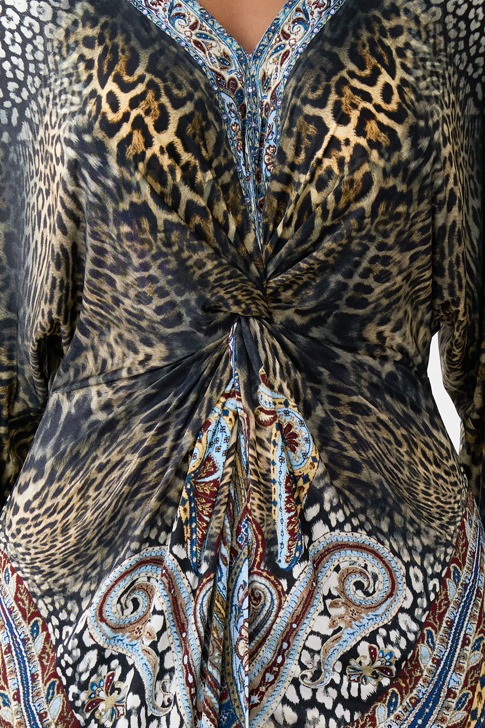 The CAMILLA SHORT SLEEVE KAFTAN WITH TIE WAIST FELINE FOLKLORE in our  print.
