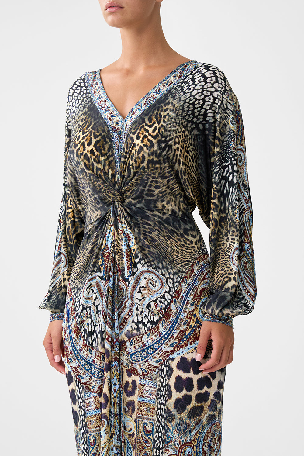 The CAMILLA SHORT SLEEVE KAFTAN WITH TIE WAIST FELINE FOLKLORE in our  print.