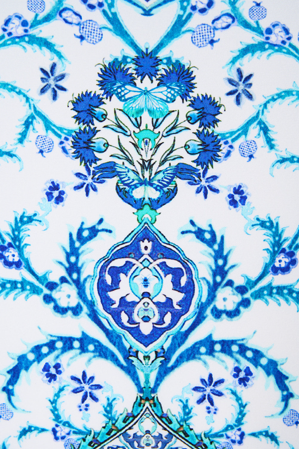 The CAMILLA SHIRT TUNIC WITH SIDE BUTTONS BOTANICAL BALLADS in our  print.