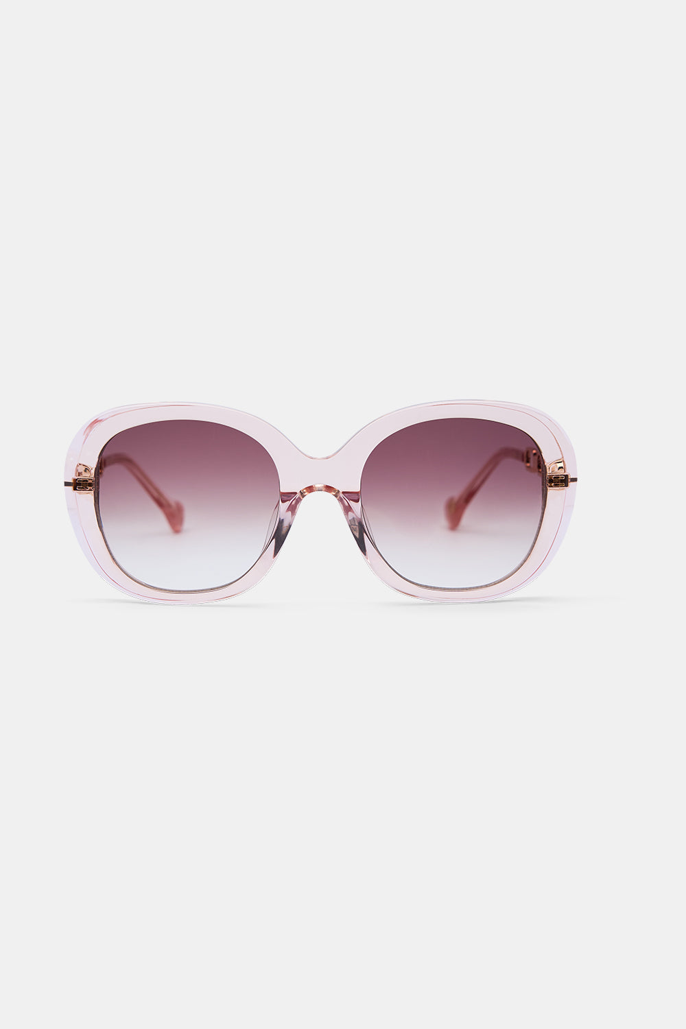 The CAMILLA REVERSIBLE MONOGRAM BUCKLE BELT SOLID PINK in our  print.