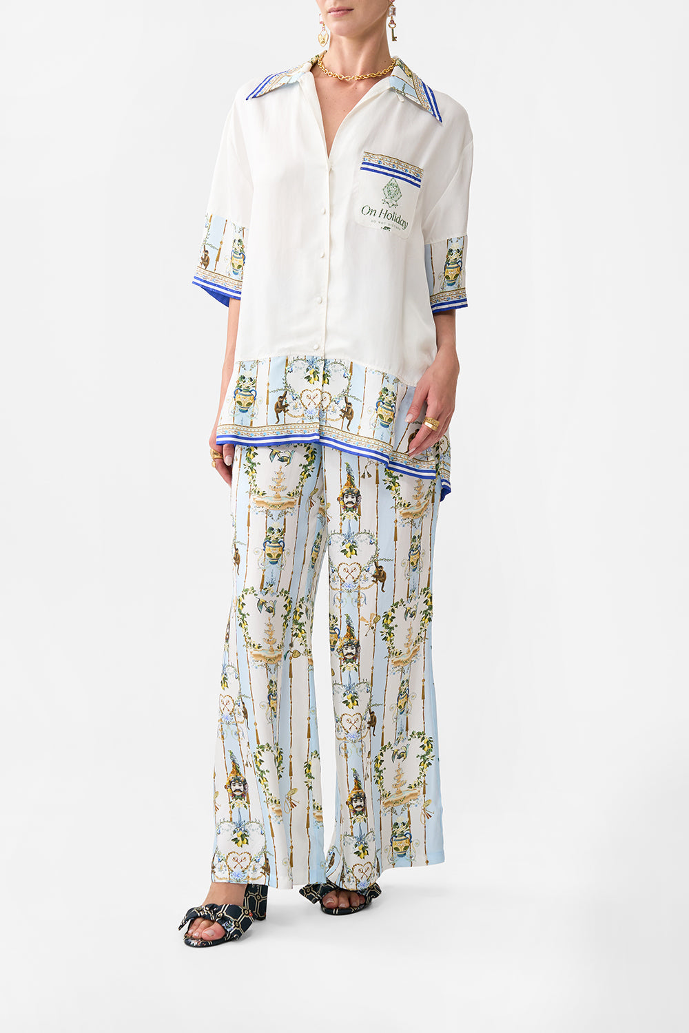 The CAMILLA CROPPED WRAP TOP WITH PLEATED DETAIL NOBLE ENDEAVOURS in our  print.