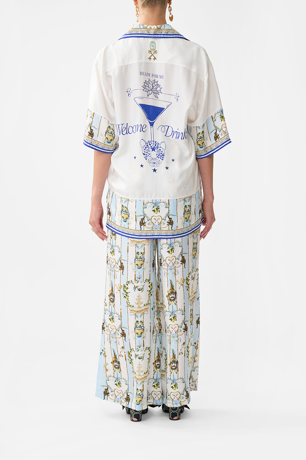 The CAMILLA CROPPED WRAP TOP WITH PLEATED DETAIL NOBLE ENDEAVOURS in our  print.