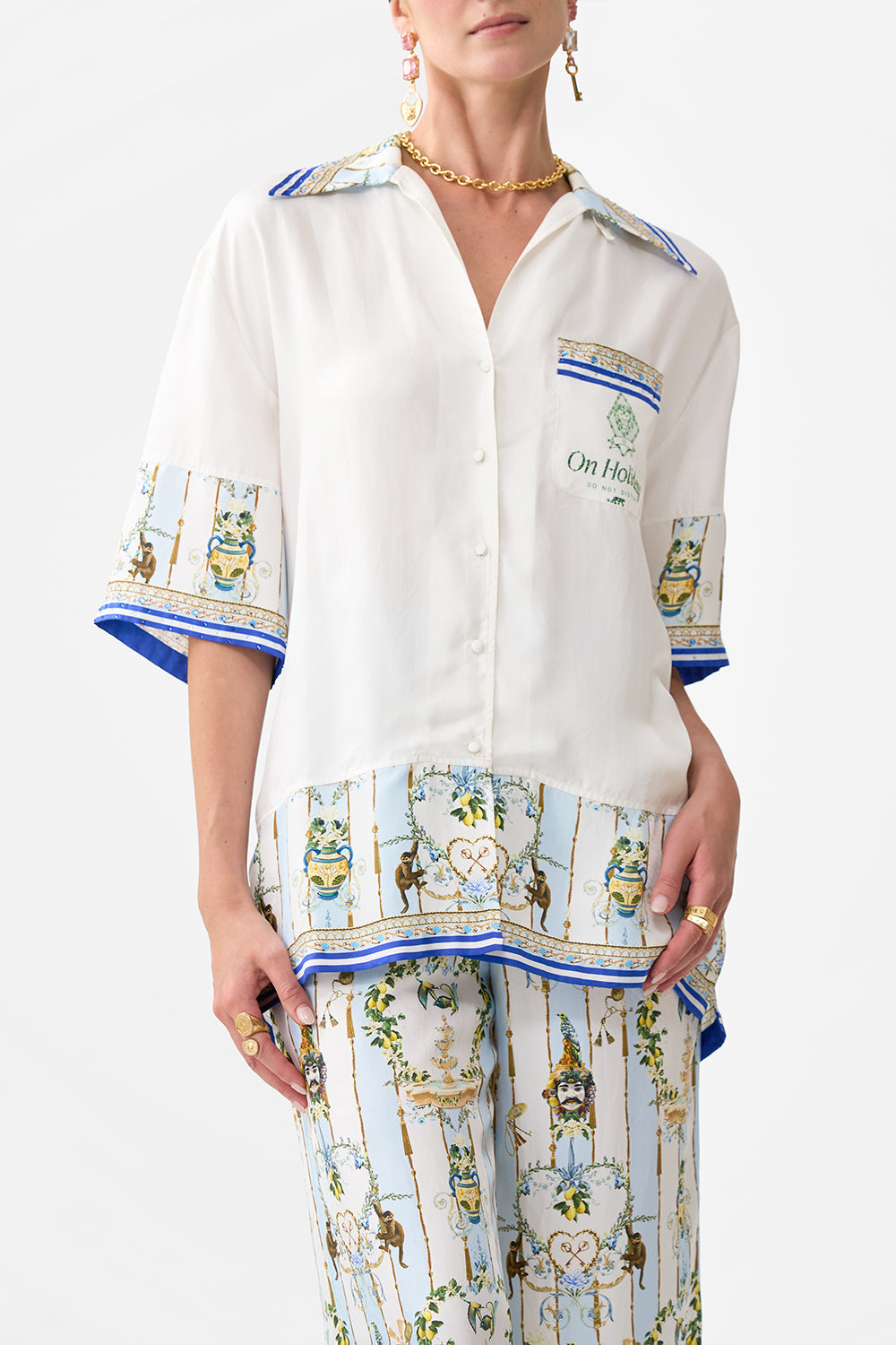 The CAMILLA CROPPED WRAP TOP WITH PLEATED DETAIL NOBLE ENDEAVOURS in our  print.