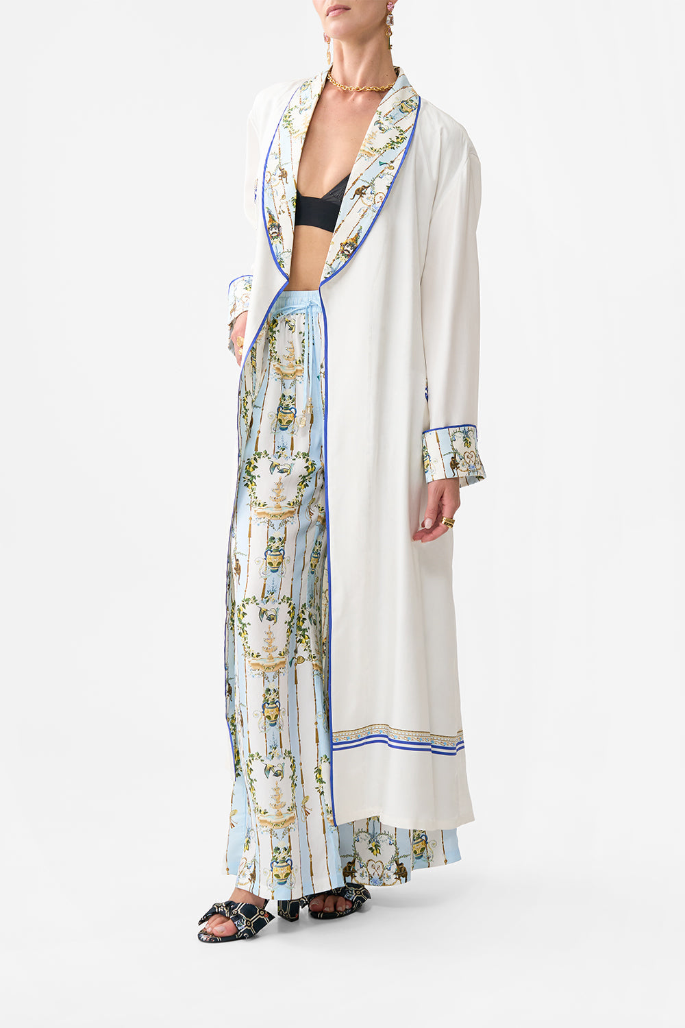 The CAMILLA TIERED DRESS WITH RUFFLE FRILL SLEEVES DRESSING ROOM DRAMA in our  print.