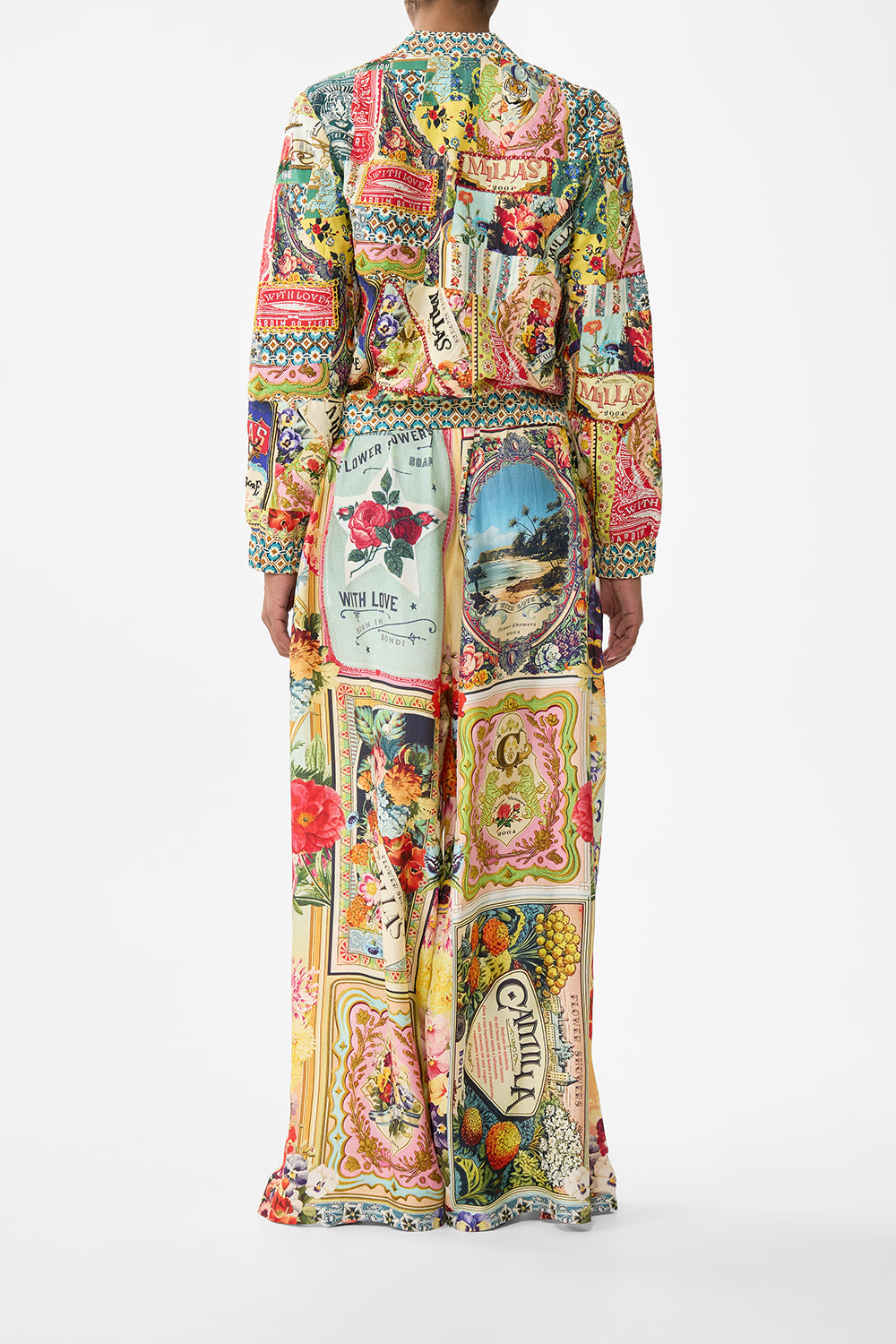 The CAMILLA FLARED SLEEVE DRESS TILED IN TIME in our  print.