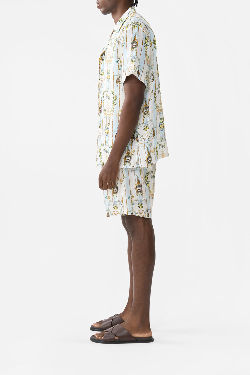 The CAMILLA OVERSIZED BUTTON THROUGH SHORT SLEEVE SHIRT WELCOME TO THE WHITE LOTUS in our  print.