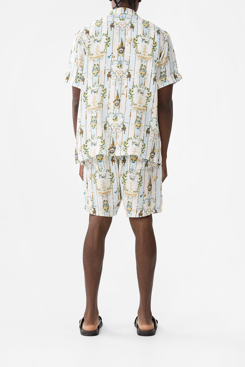 The CAMILLA OVERSIZED BUTTON THROUGH SHORT SLEEVE SHIRT WELCOME TO THE WHITE LOTUS in our  print.