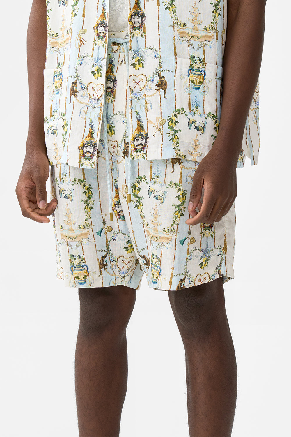 The CAMILLA OVERSIZED BUTTON THROUGH SHORT SLEEVE SHIRT WELCOME TO THE WHITE LOTUS in our  print.