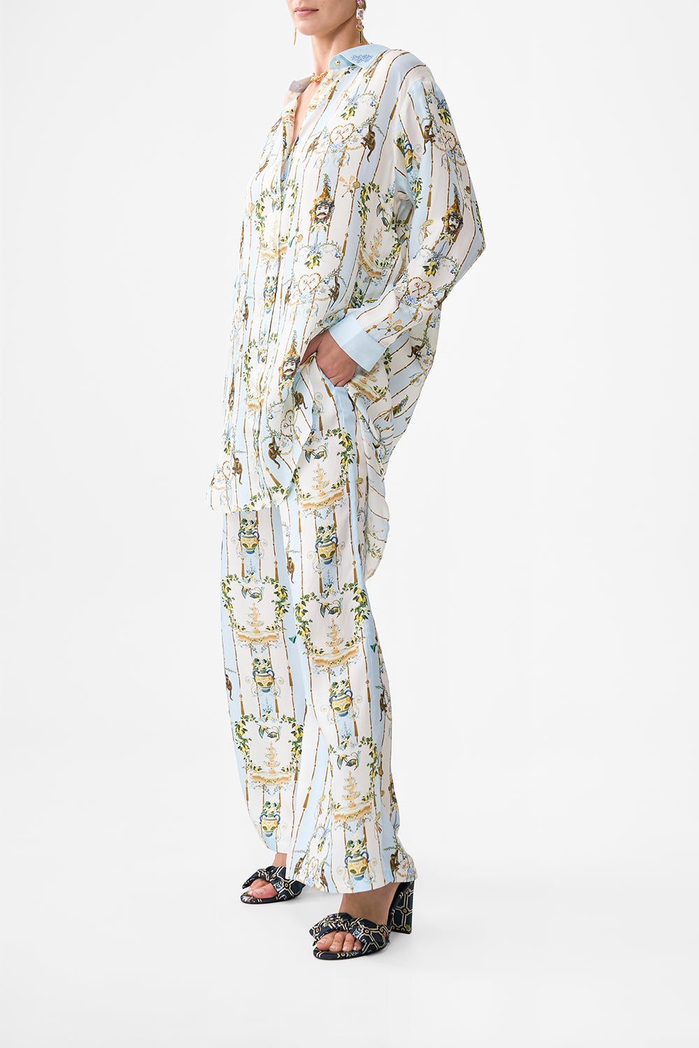 The CAMILLA HIGH WAISTED TIERED SKIRT FLOWER SHOWERS in our  print.