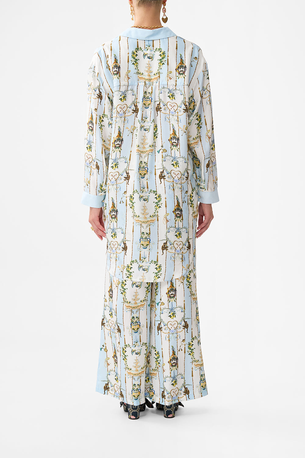 The CAMILLA HIGH WAISTED TIERED SKIRT FLOWER SHOWERS in our  print.