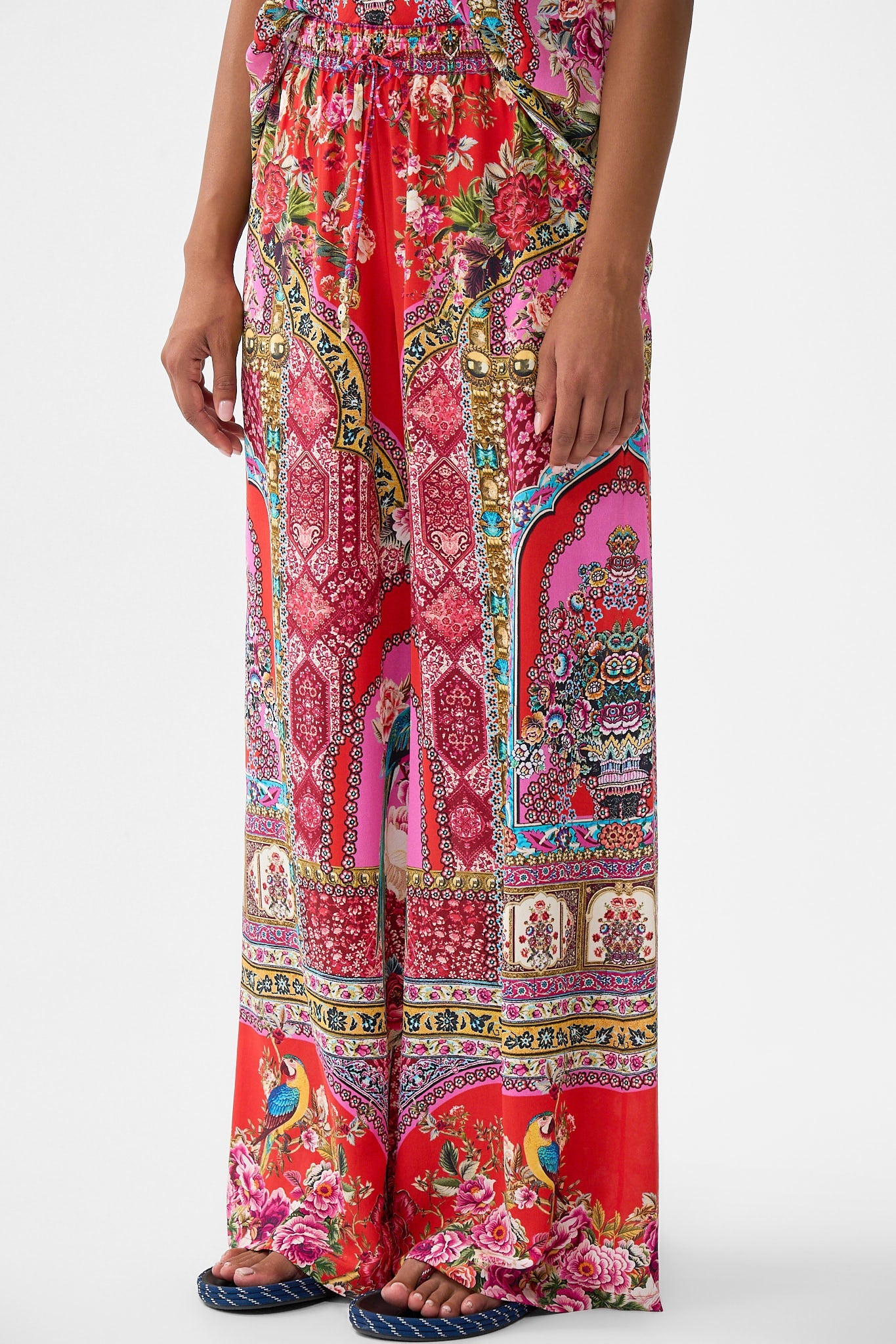 The CAMILLA WOVEN SHORT SARONG WITH MACRAME TIE WAIST FABRIC OF TIME in our  print.