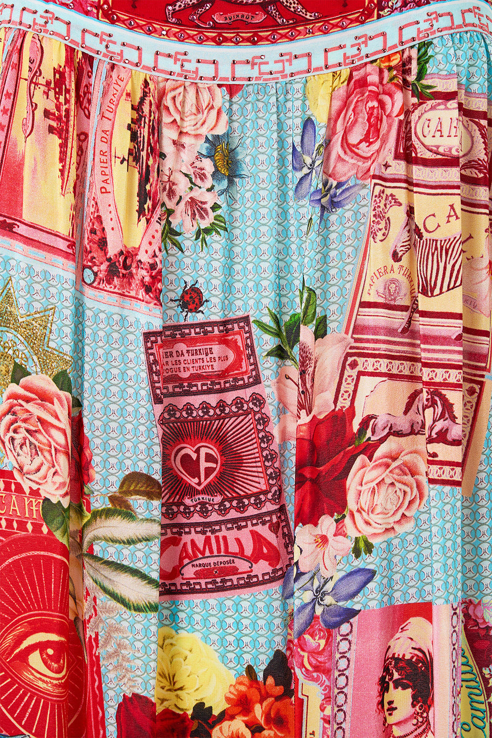 The CAMILLA WAISTED DRESS WITH HEM RUFFLE HEIRLOOM EMPIRE in our  print.