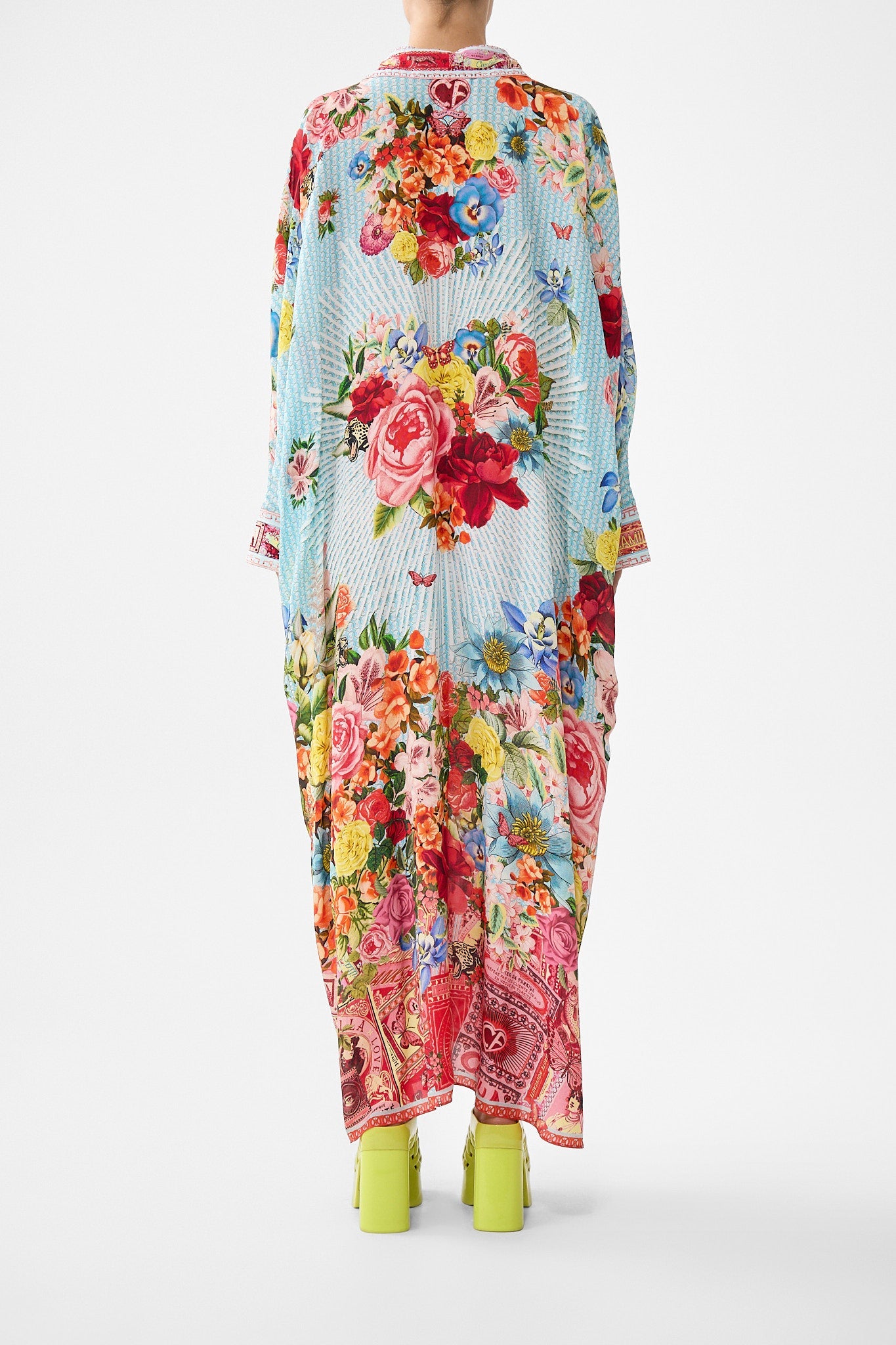 The CAMILLA STRAPPY DRESS WITH TWIST FRONT TOTEMS AND TREASURES in our TOTEMS AND TREASURES print.