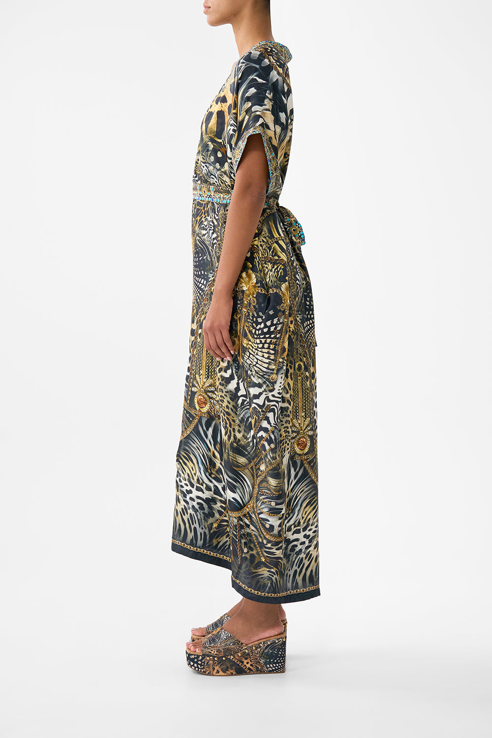 The CAMILLA MID LENGTH BOARDSHORT WITH ELASTIC WAIST MINIATURE MOMENTS in our MINIATURE MOMENTS print.