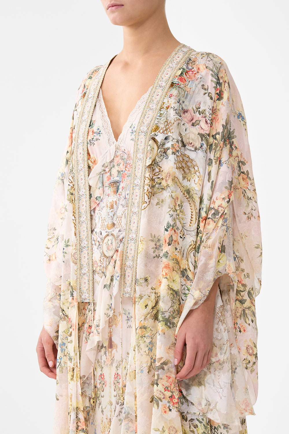 The CAMILLA DEEP V-NECK HARDWARE SHORT KAFTAN LEGEND HAS IT in our  print.