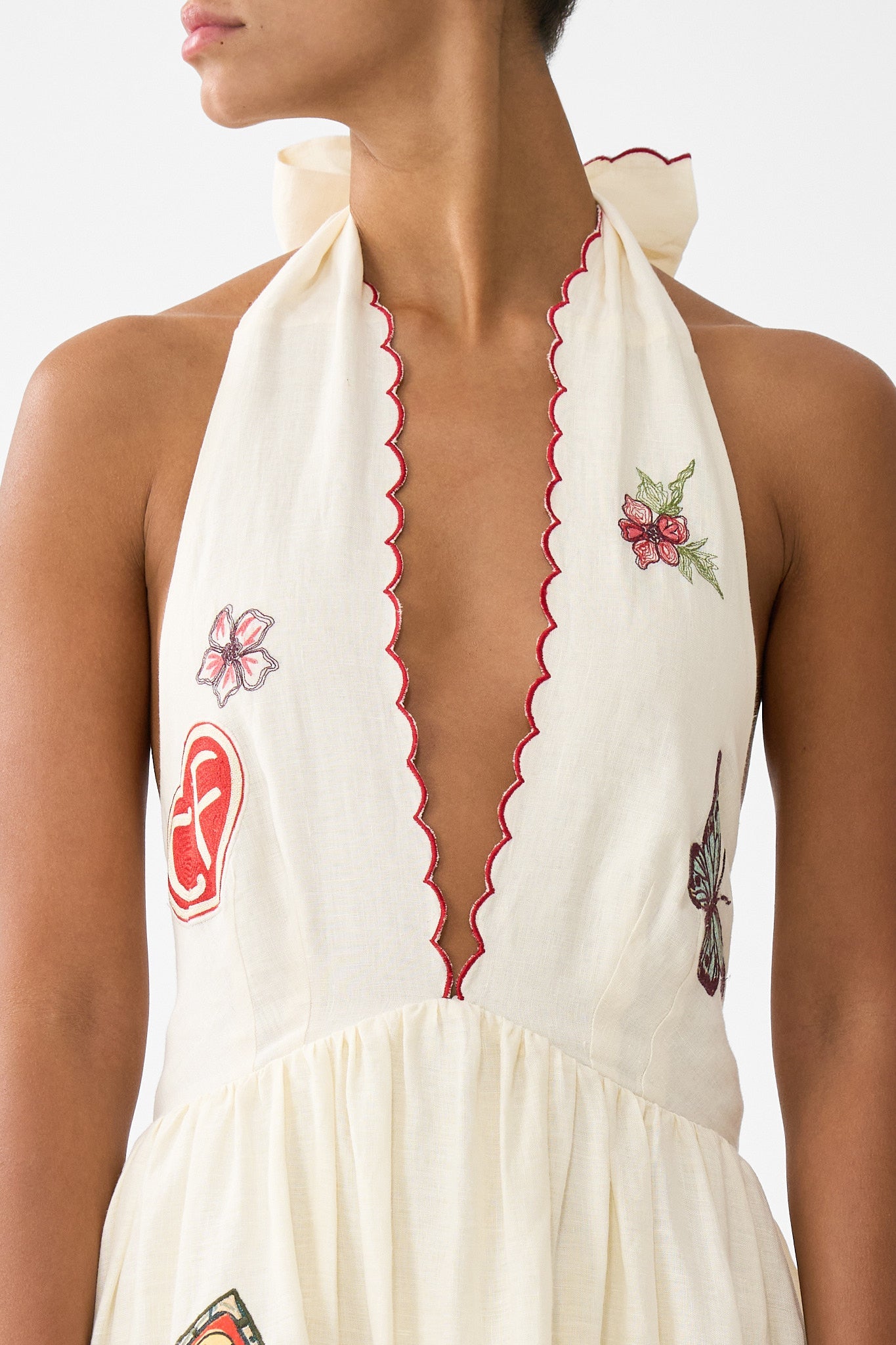 The CAMILLA TIE FRONT FRILL SLEEVE JUMPSUIT DARLING BUDS in our  print.