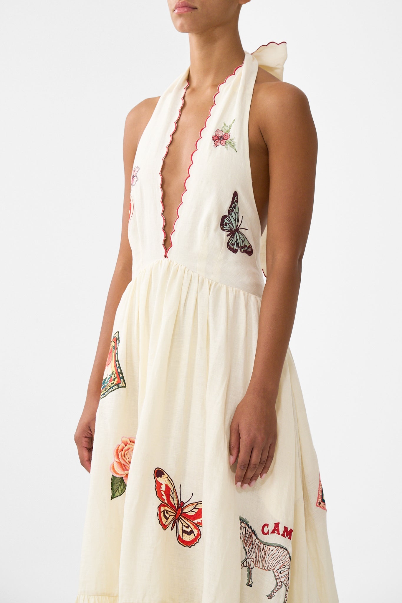 The CAMILLA TIE FRONT FRILL SLEEVE JUMPSUIT DARLING BUDS in our DARLING BUDS print.