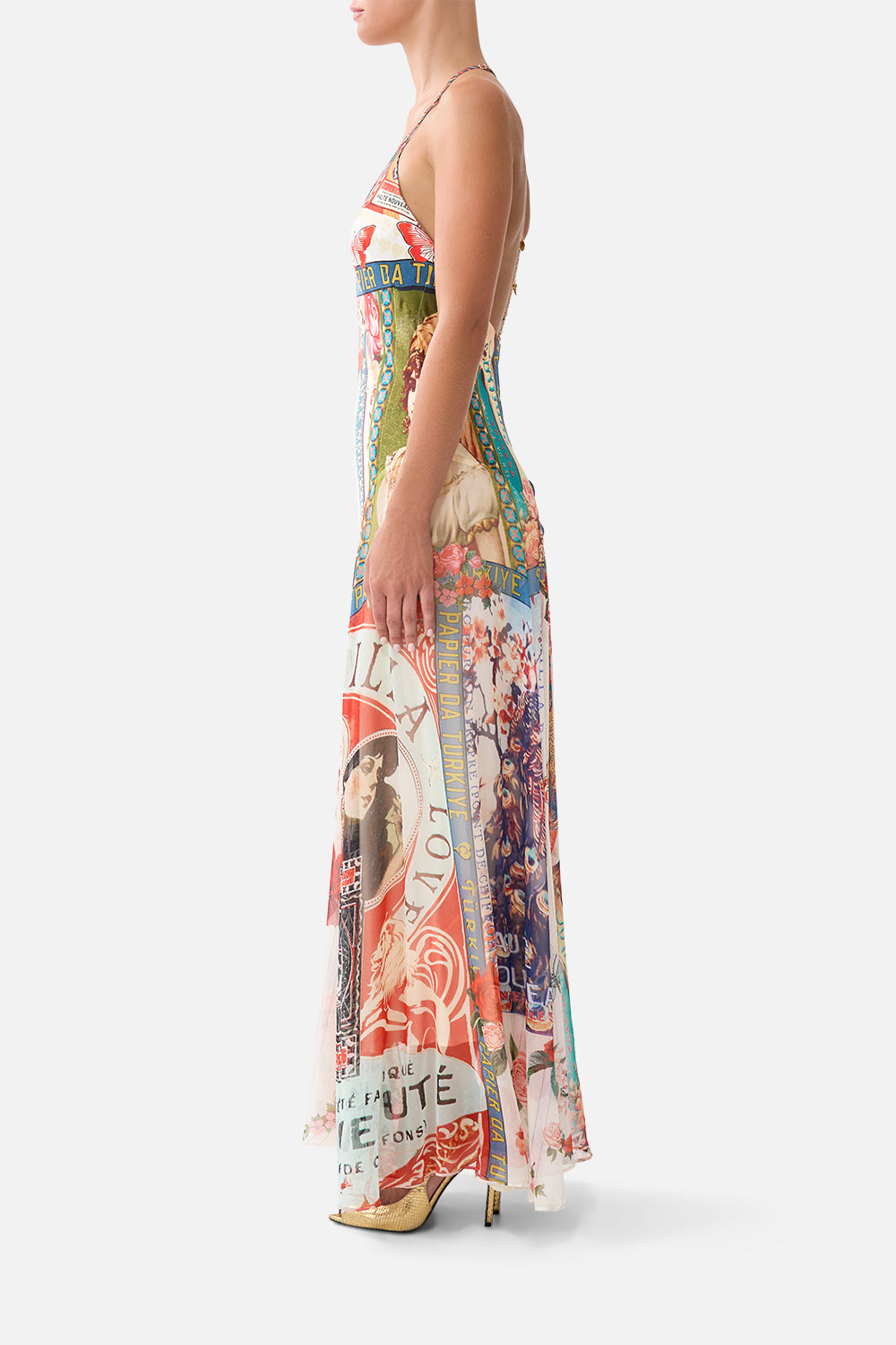 The CAMILLA KIDS ROUND NECK LAYERED HIGH LOW DRESS ILLUSTRATION NATION in our ILLUSTRATION NATION print.