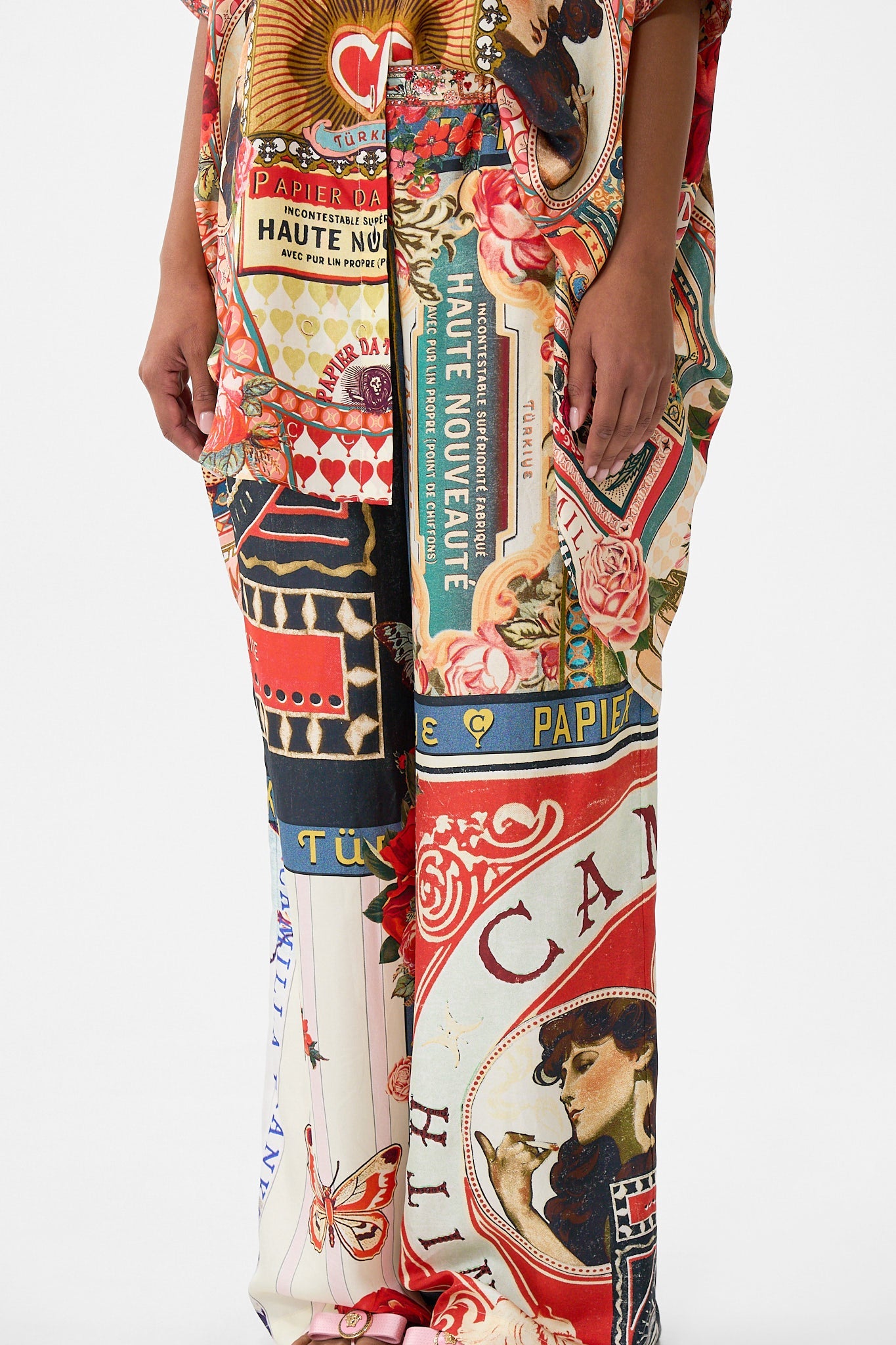 The CAMILLA MID LENGTH BOARDSHORT WITH ELASTIC WAIST TURKISH DELIGHT in our  print.