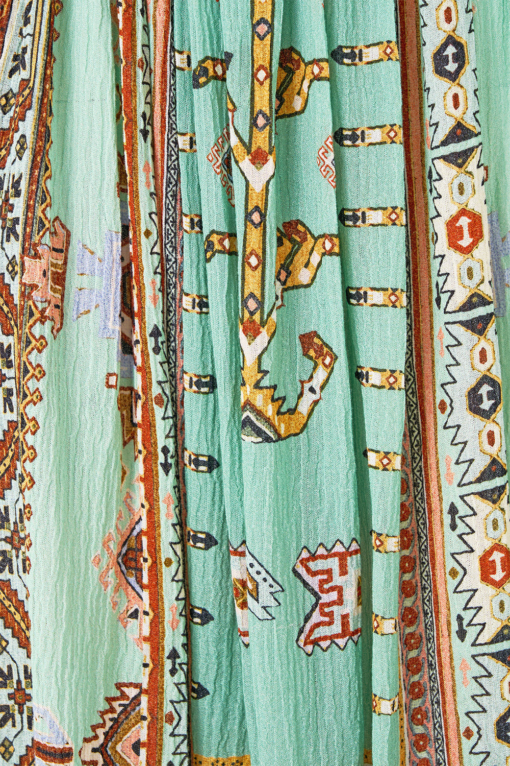 The CAMILLA DRAPED WRAP MAXI SARONG WITH TIE WAIST ANIMAL ALCHEMY in our  print.