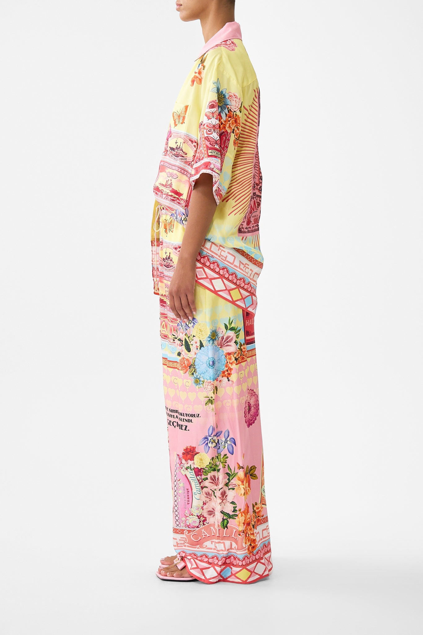 The CAMILLA RELAXED V NECK KNIT TOP NOTES FROM THE BLUE ROOM in our NOTES FROM THE BLUE ROOM print.