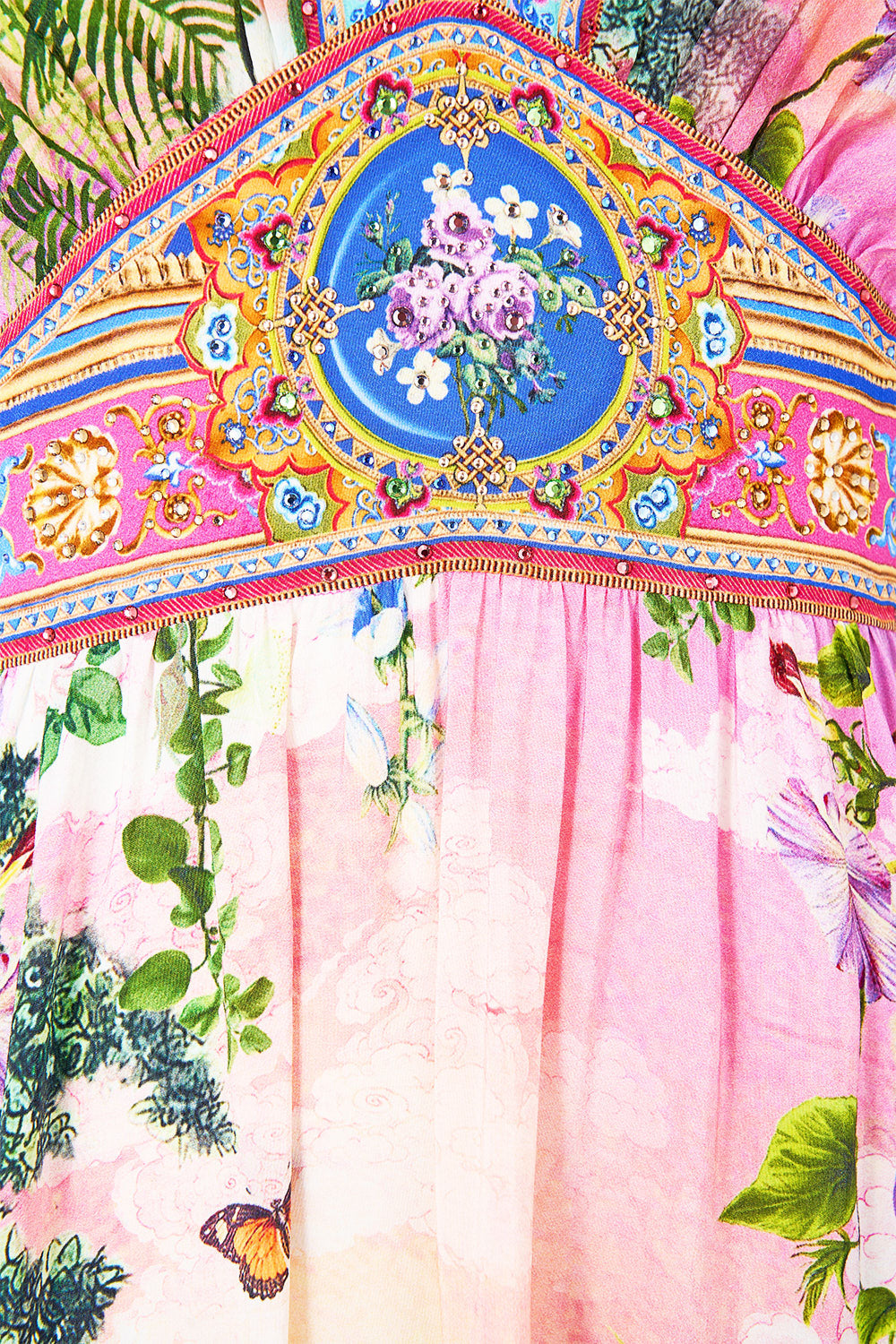 The CAMILLA DEEP V-FRILL SHORT SLEEVE TOP SULTANS AND QUEENS in our  print.