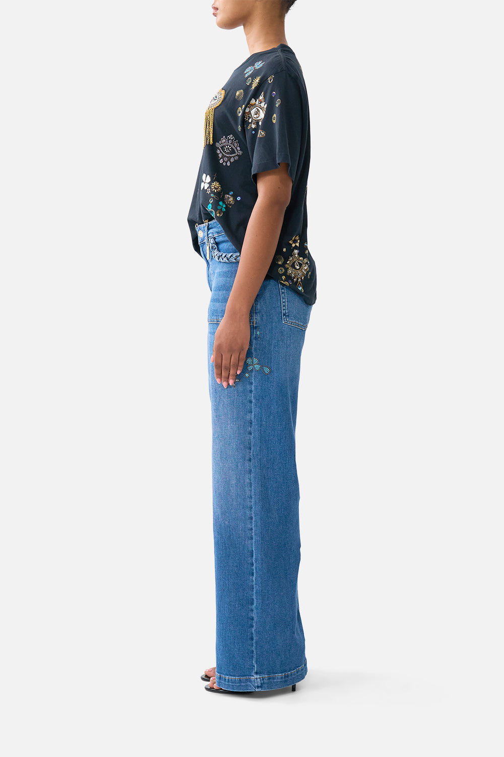The CAMILLA HIGH WAISTED FLARED TROUSER ARANJUEZ ANIMALIA in our  print.