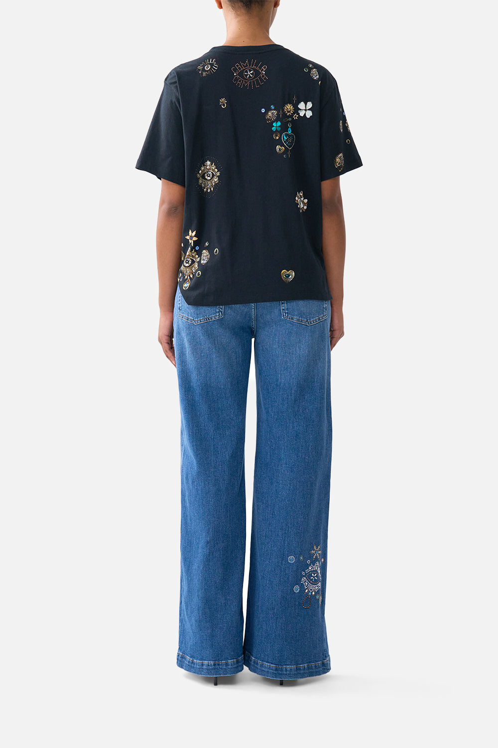 The CAMILLA HIGH WAISTED FLARED TROUSER ARANJUEZ ANIMALIA in our  print.