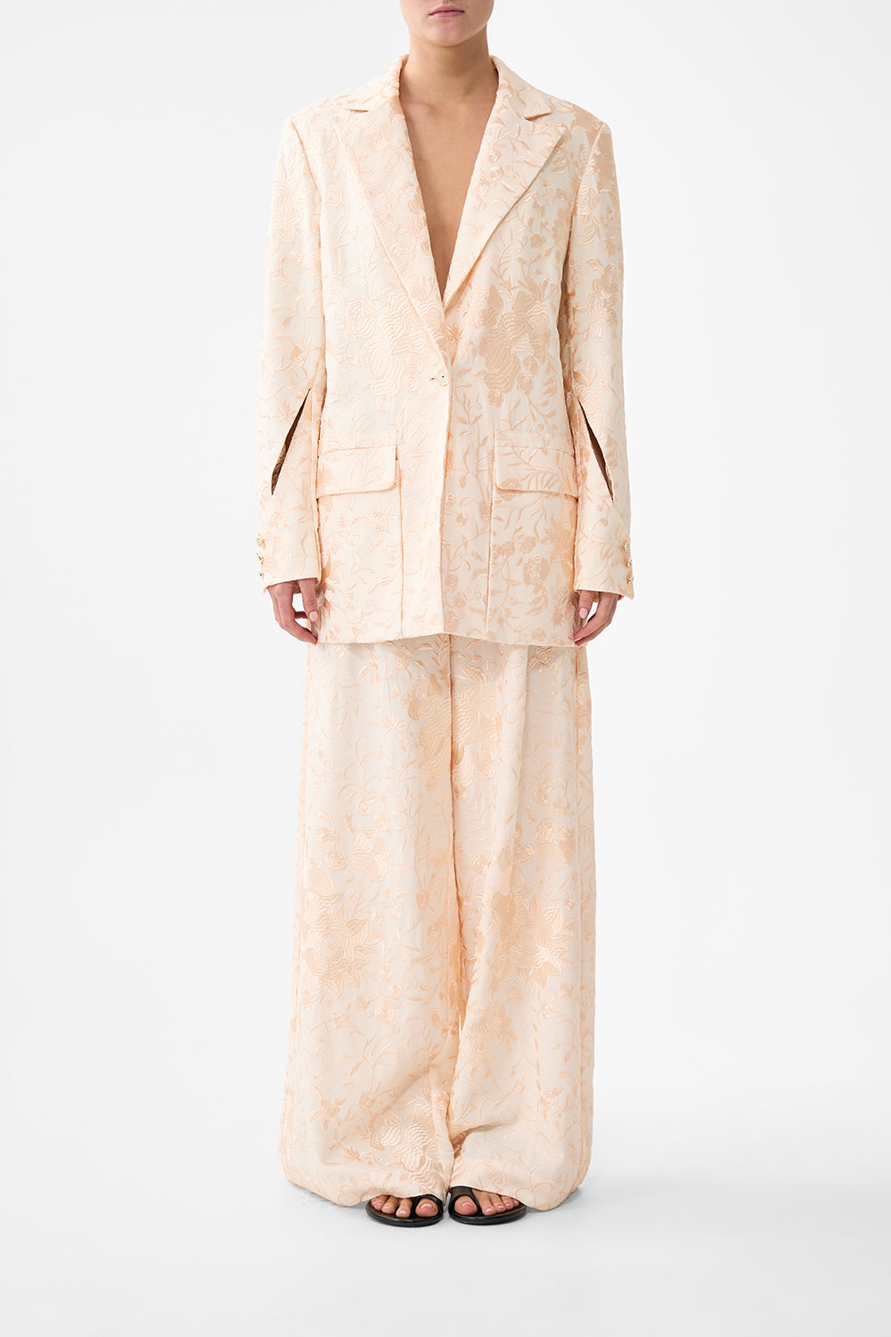 The CAMILLA TAILORED PANT WITH WAIST BUTTON DETAIL A TILED WONDERLAND in our  print.