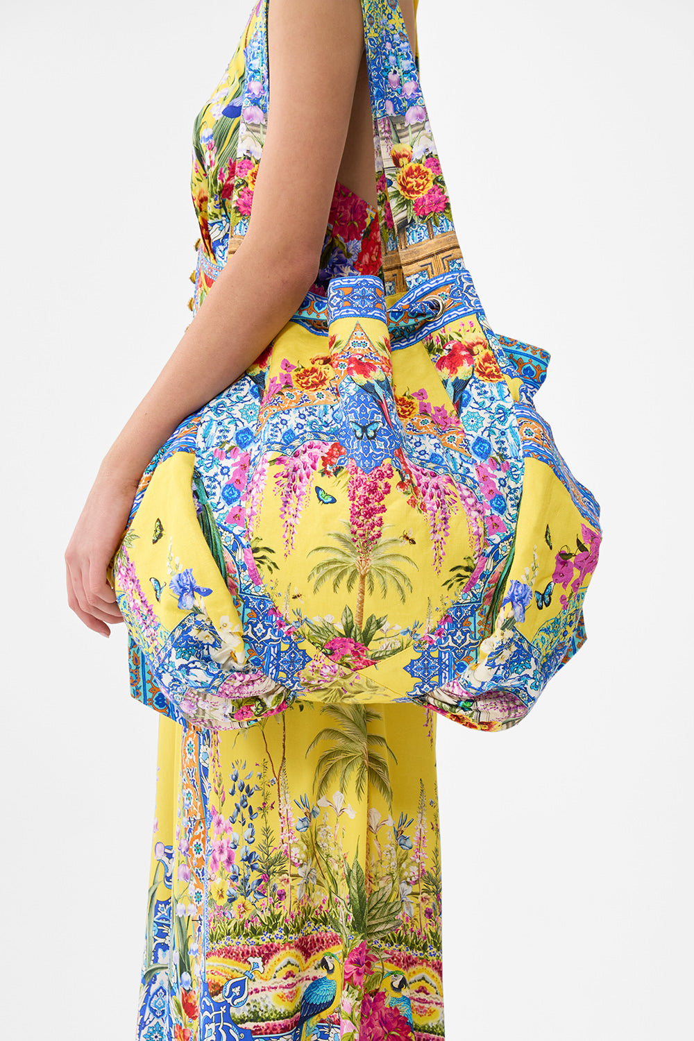 The CAMILLA TAILORED PANT WITH WAIST BUTTON DETAIL A TILED WONDERLAND in our  print.